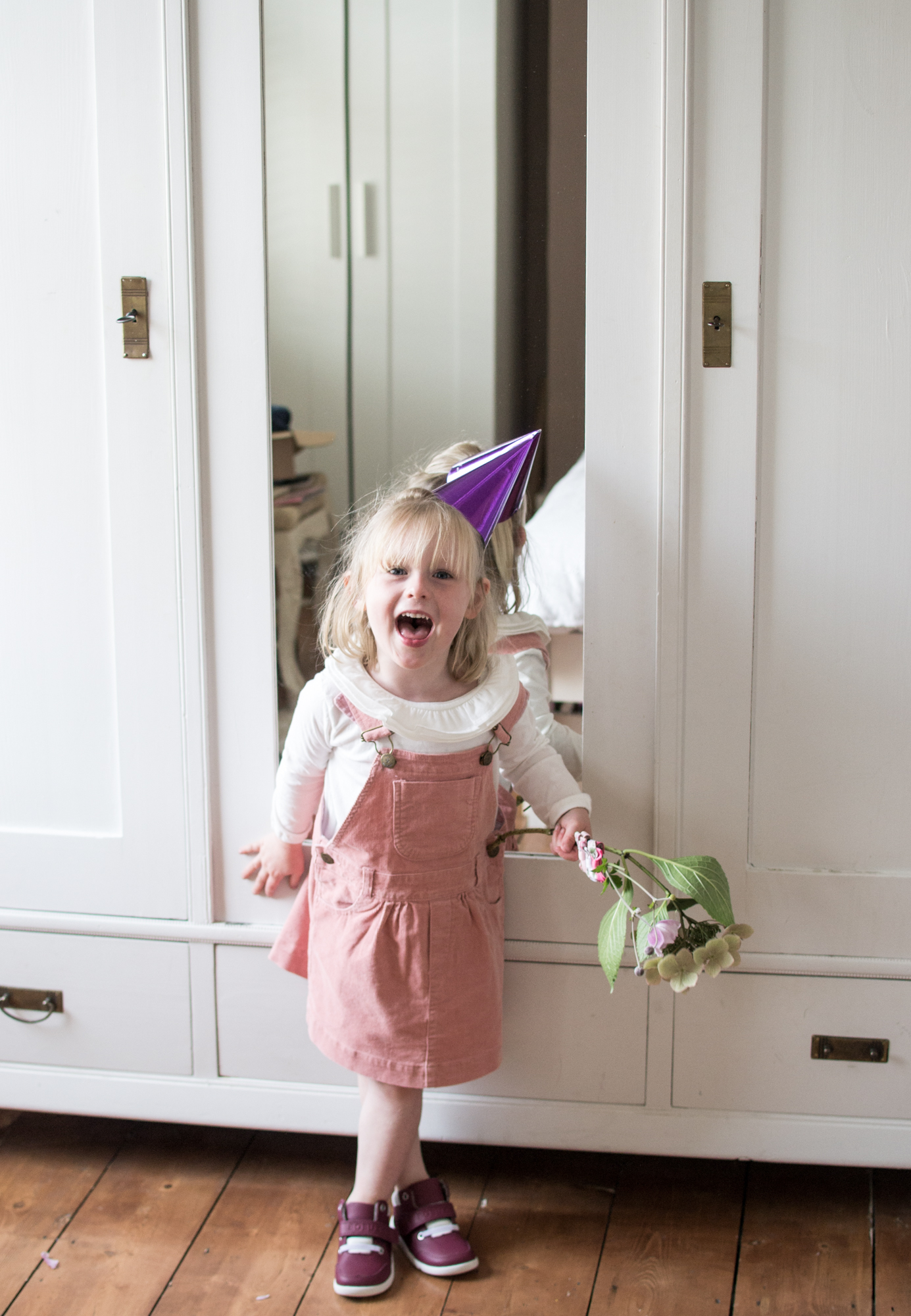 Pink Pinafore Dress from Dotty Dungarees & Bobux Trainers