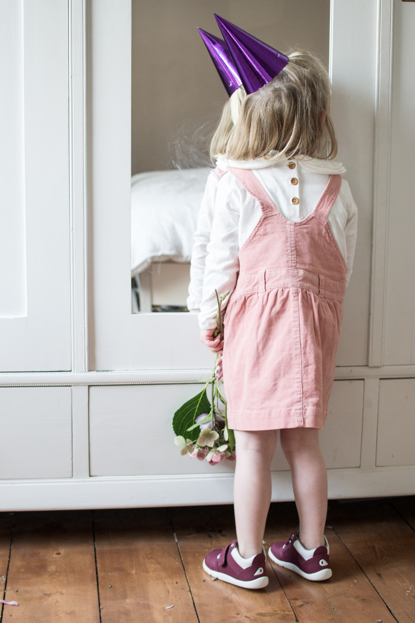 Pink Pinafore Dress from Dotty Dungarees & Bobux Trainers