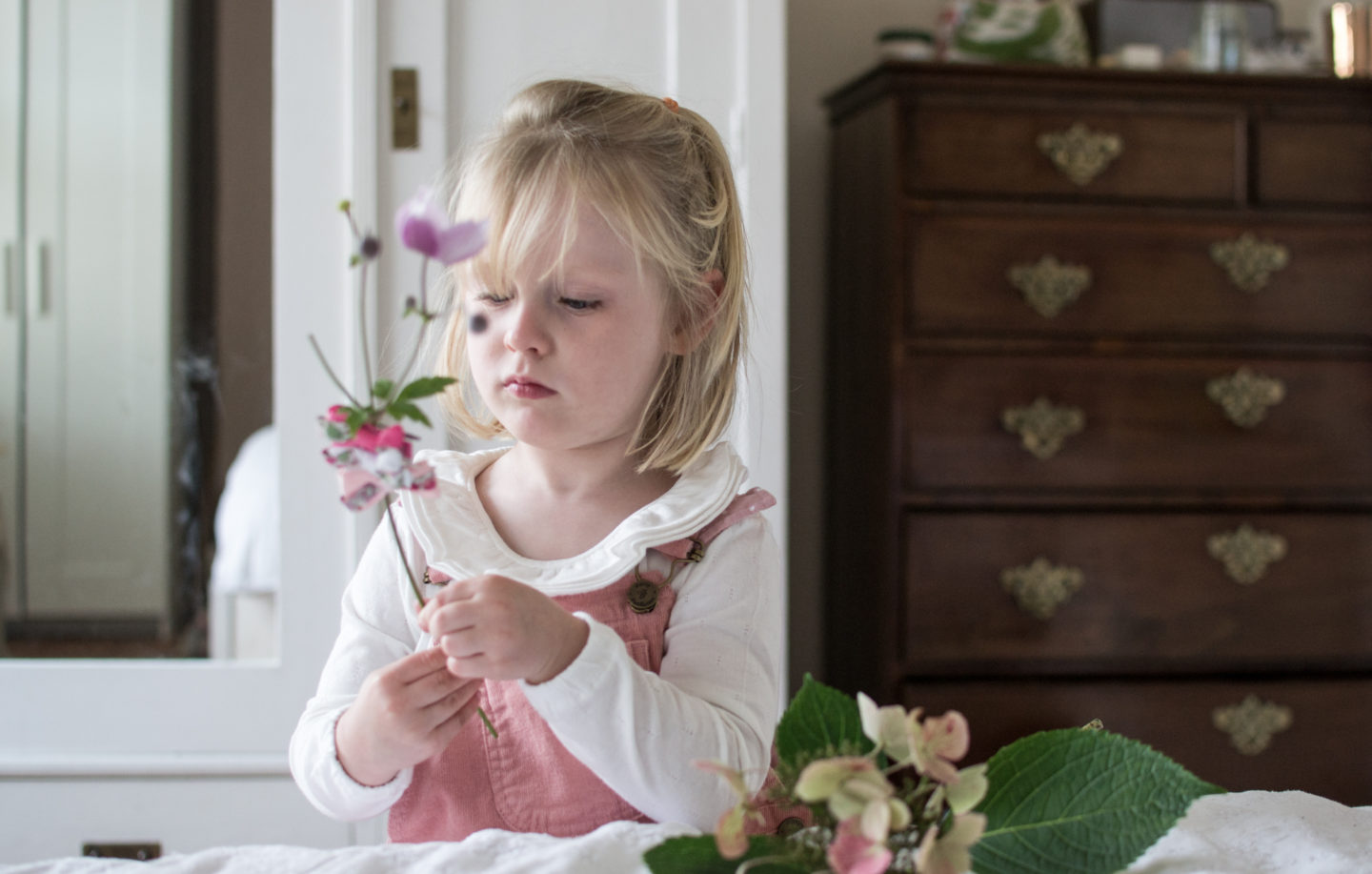 Pink Pinafore Dress and white ruffle top from Dotty Dungarees 