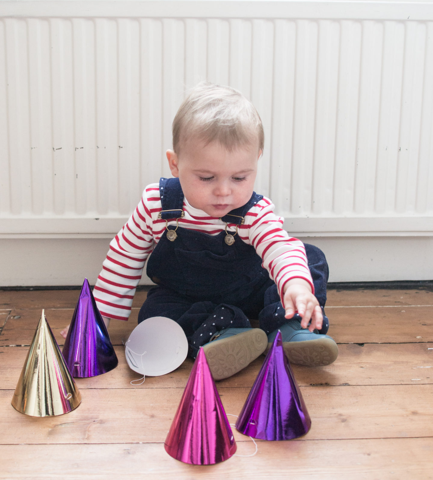 Navy cord dungarees and a red stripe breton top from Dotty Dungarees