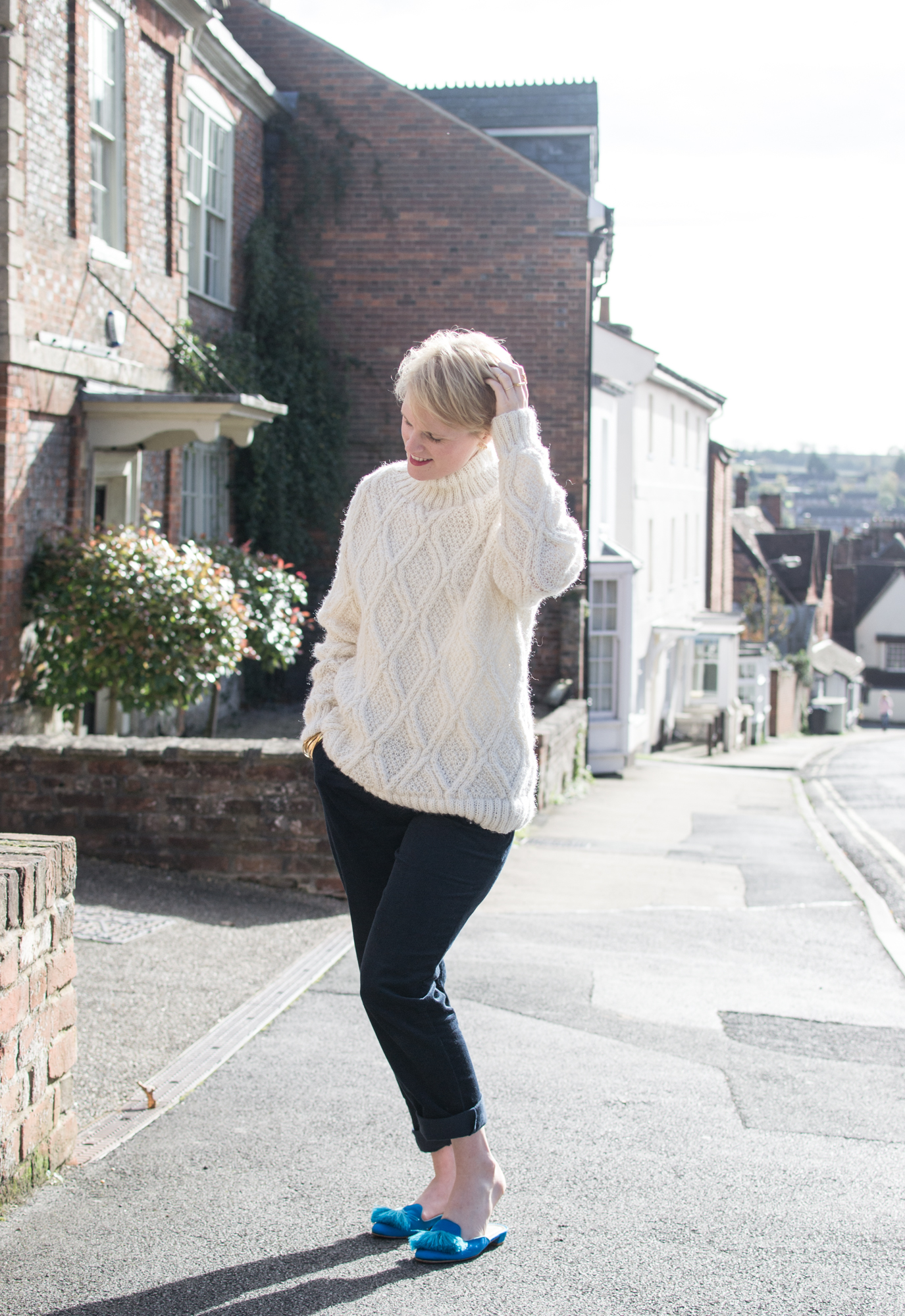 Cream Cable Knit Jumper and navy corduroy trousers from People Tree