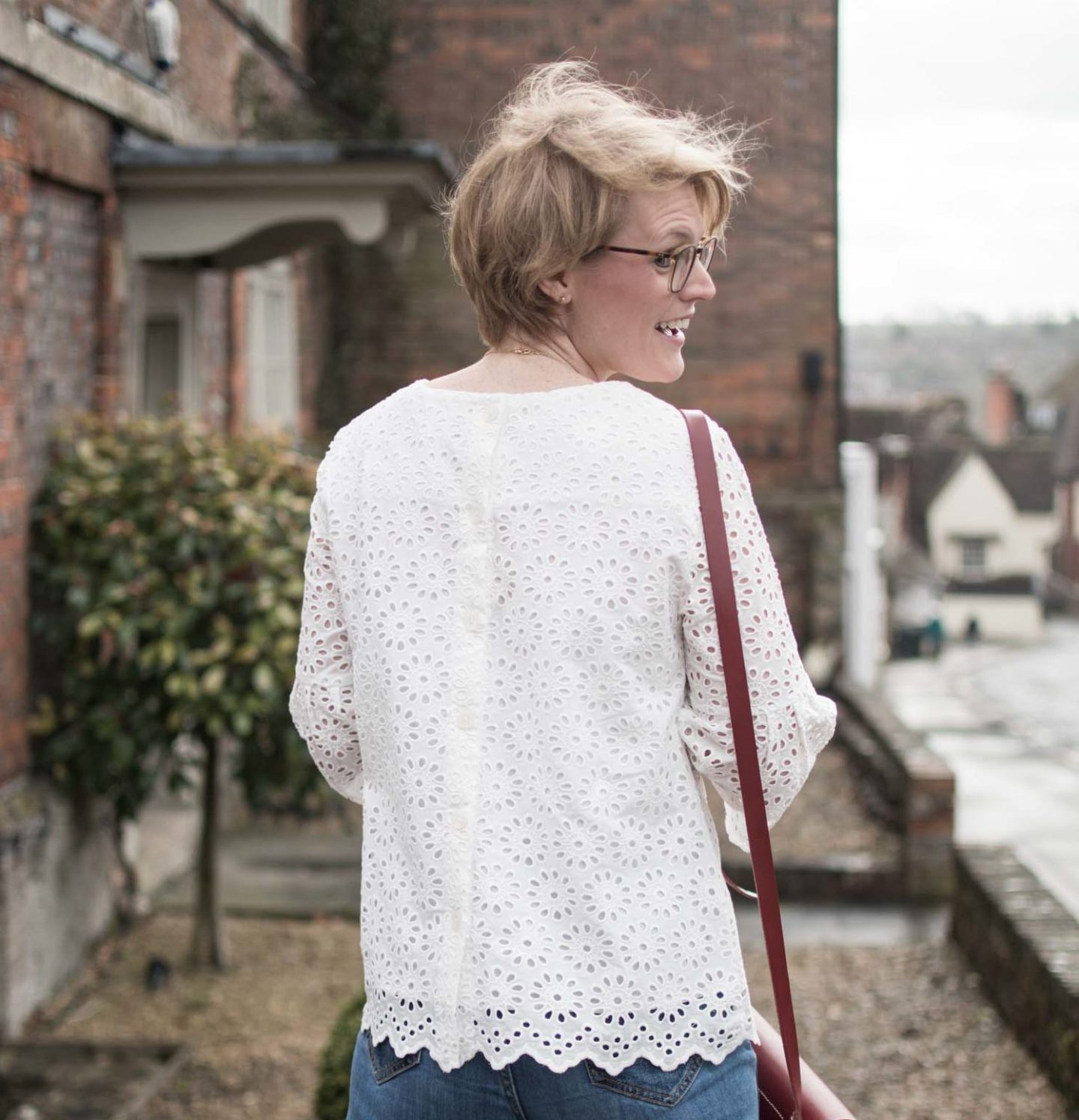 Karen Maurice, lifestyle blogger wearing Thoughts White embroidered top 