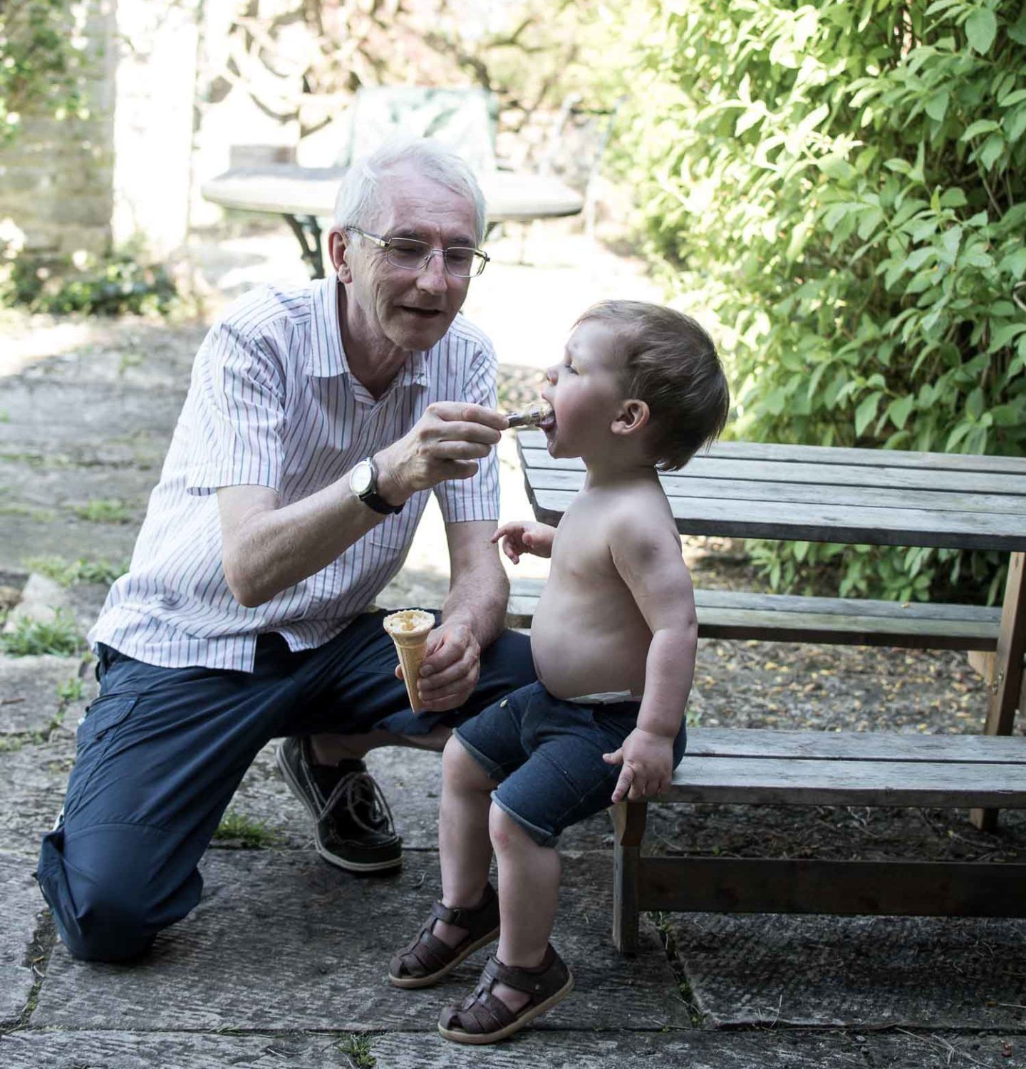 Laurie and his Grandad eating icecream