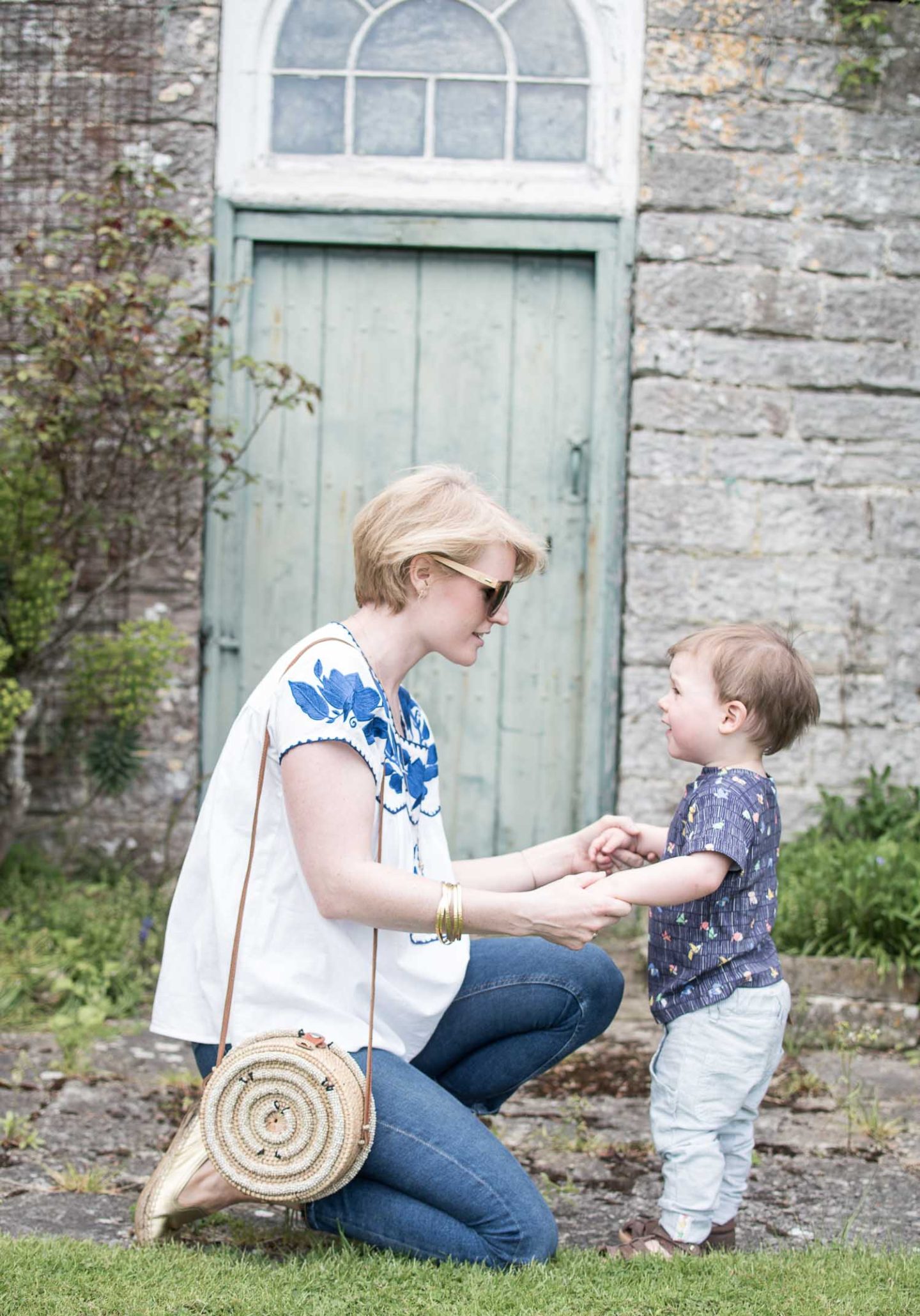 Ethical Fashion Blogger Karen Maurice wearing an embroidered top and circular straw bag from Made by Wave