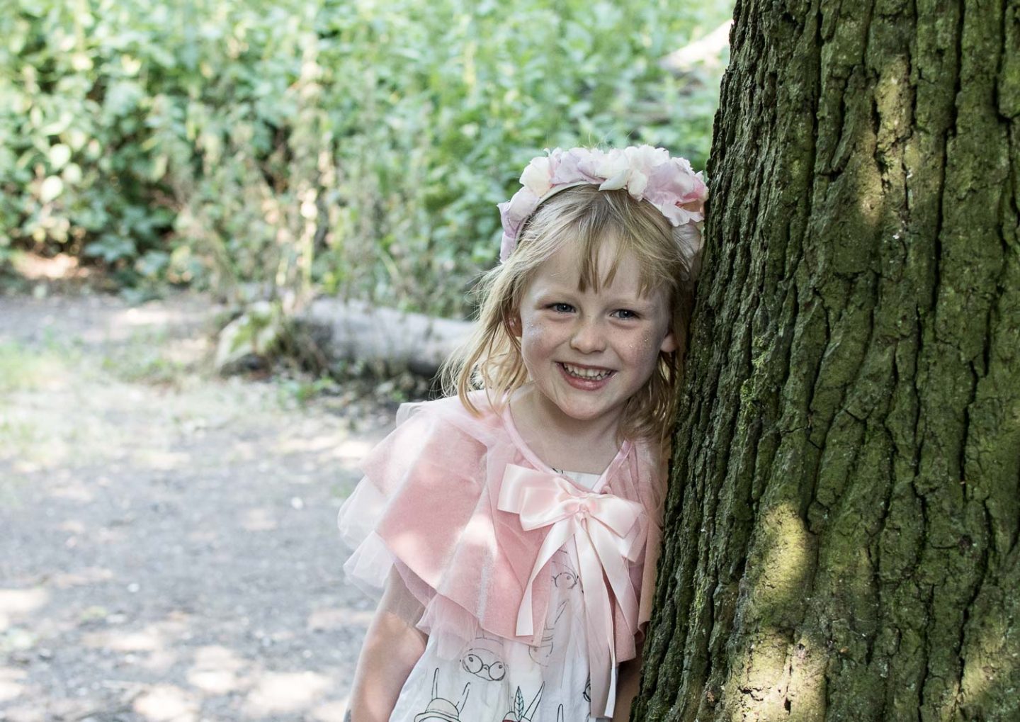 Daisy daughter of Karen Maurice of n4mummy wears a silk flower head piece from Majula Handmade