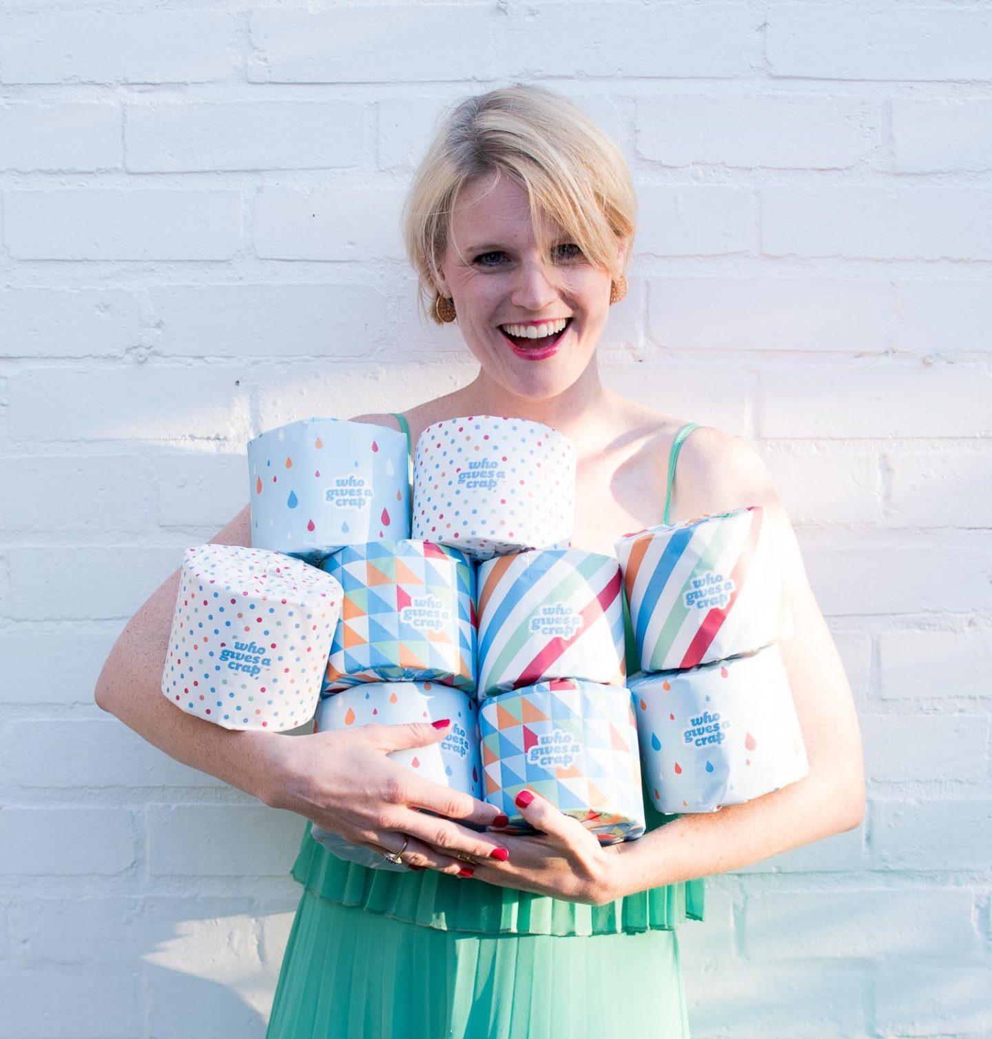 Ethical lifestyle blogger Karen Maurice of n4mummy holding Who Gives A Crap zero waste toilet paper