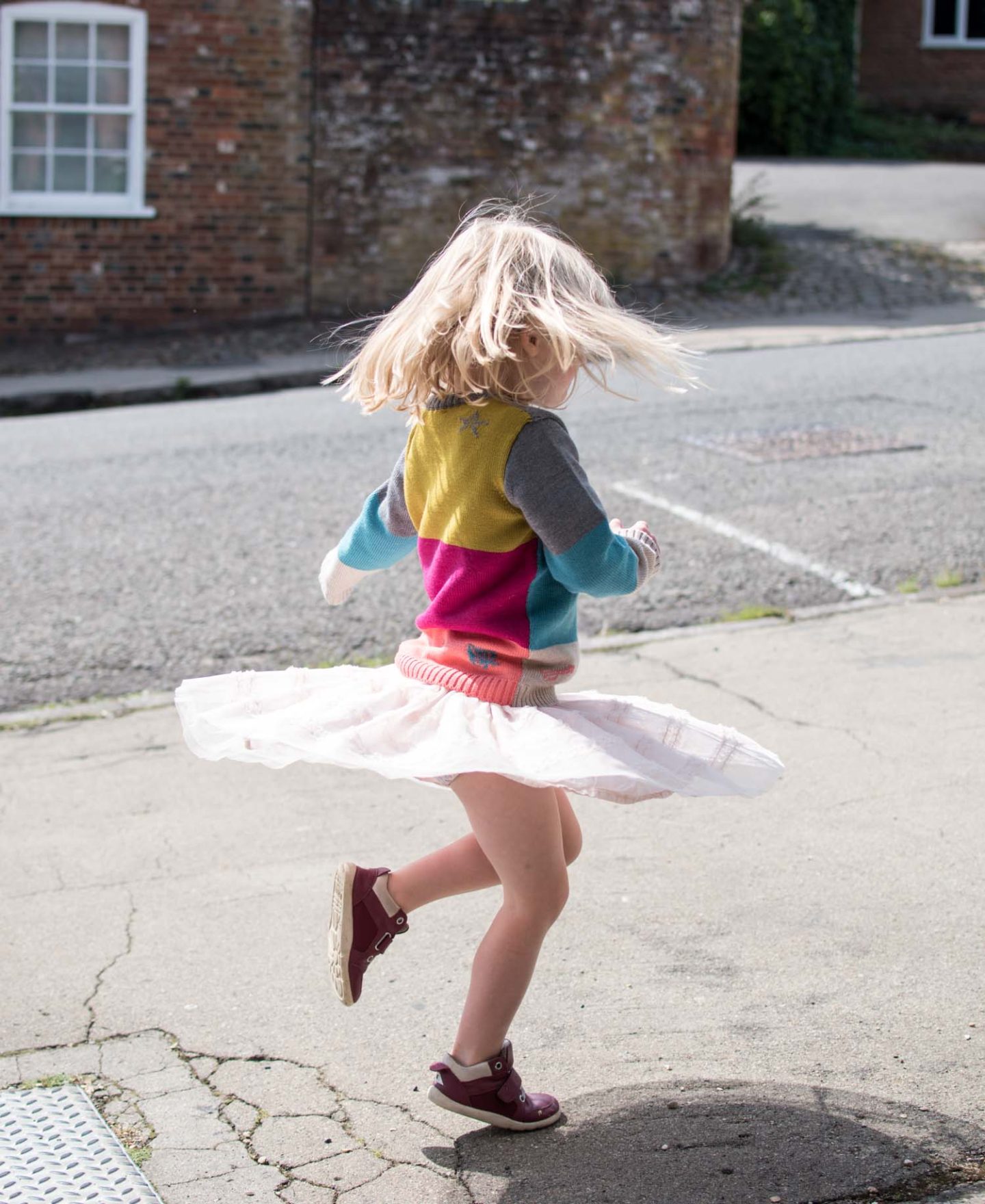 A spinning girl Daisy in the Stargazer jumper The Faraway Gang