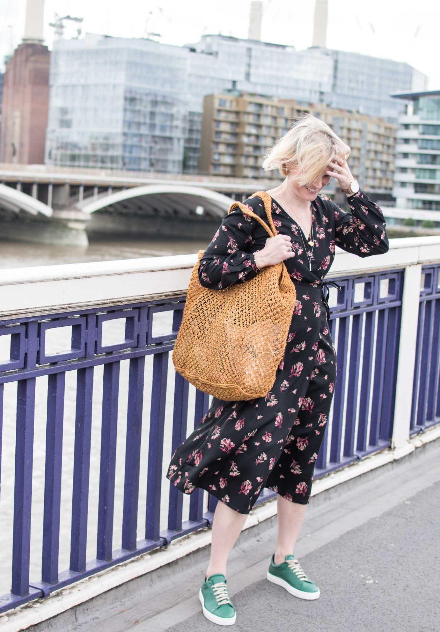 Karen Maurice of n4mummy wearing a floral dress from People Tree and a the Be Kind necklace from Wearth London