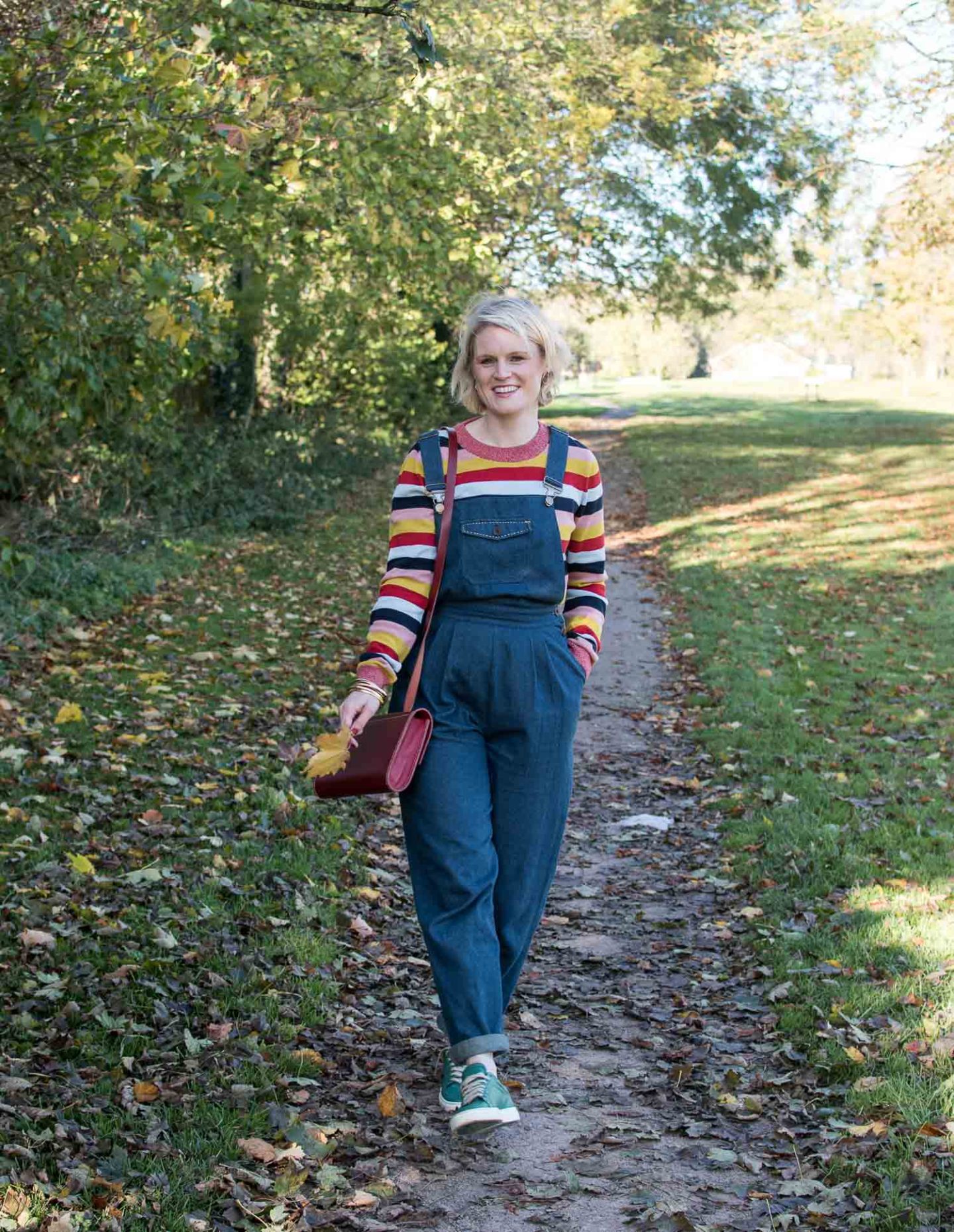 Fashion blogger Karen Maurice of n4mummy in an organic colourful striped jumper and highwaisted dungarees, affordable ethical clothing