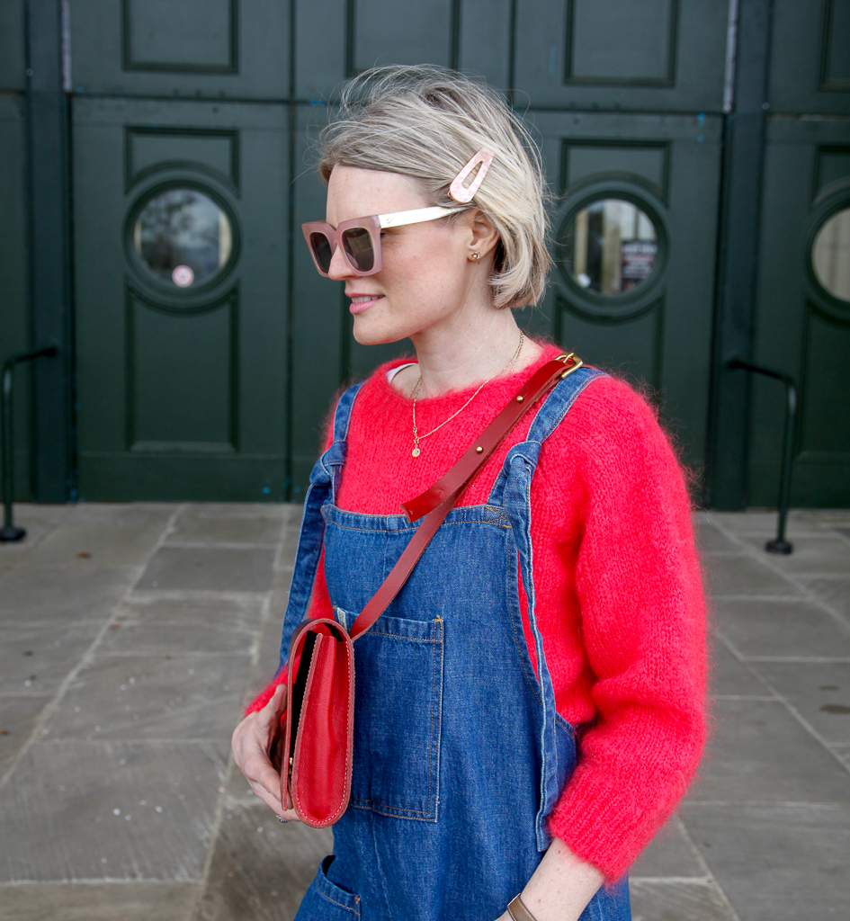 Karen Maurice of n4mummy in Vow London sunglasses, One Scoop Store hair clip, Lucy & Yak dungarees and a pink mohair jumper from Lowie