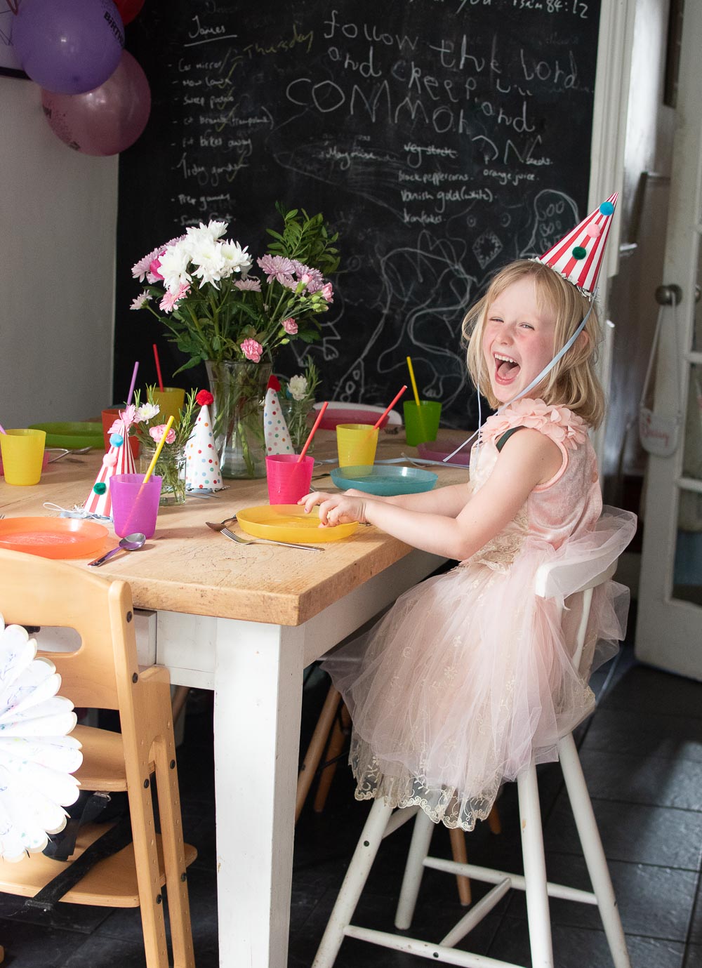 Daisy on her 5th birthday at her zero waste party table