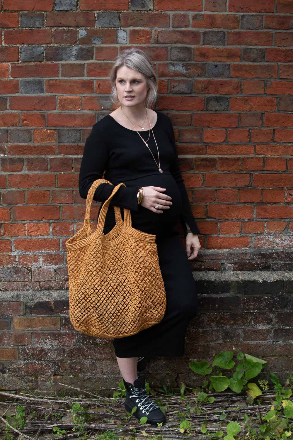 Karen Maurice of n4mummy wears a skinny ribbed black dress from Boob at 36 weeks pregnant