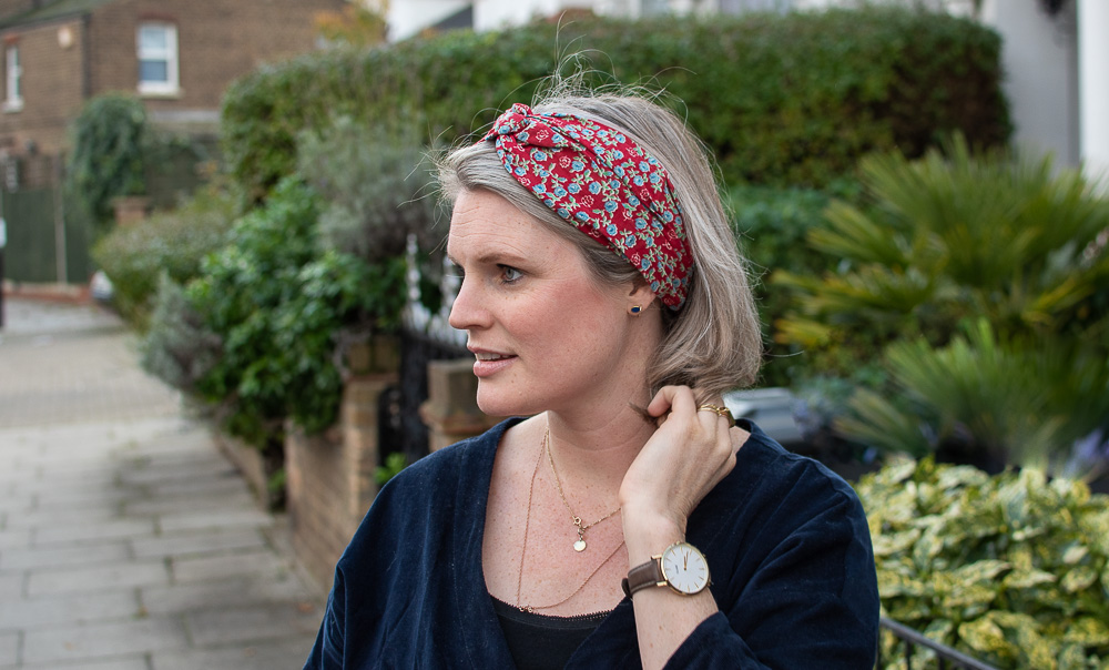 Side view of the floral headband from Clary & Peg