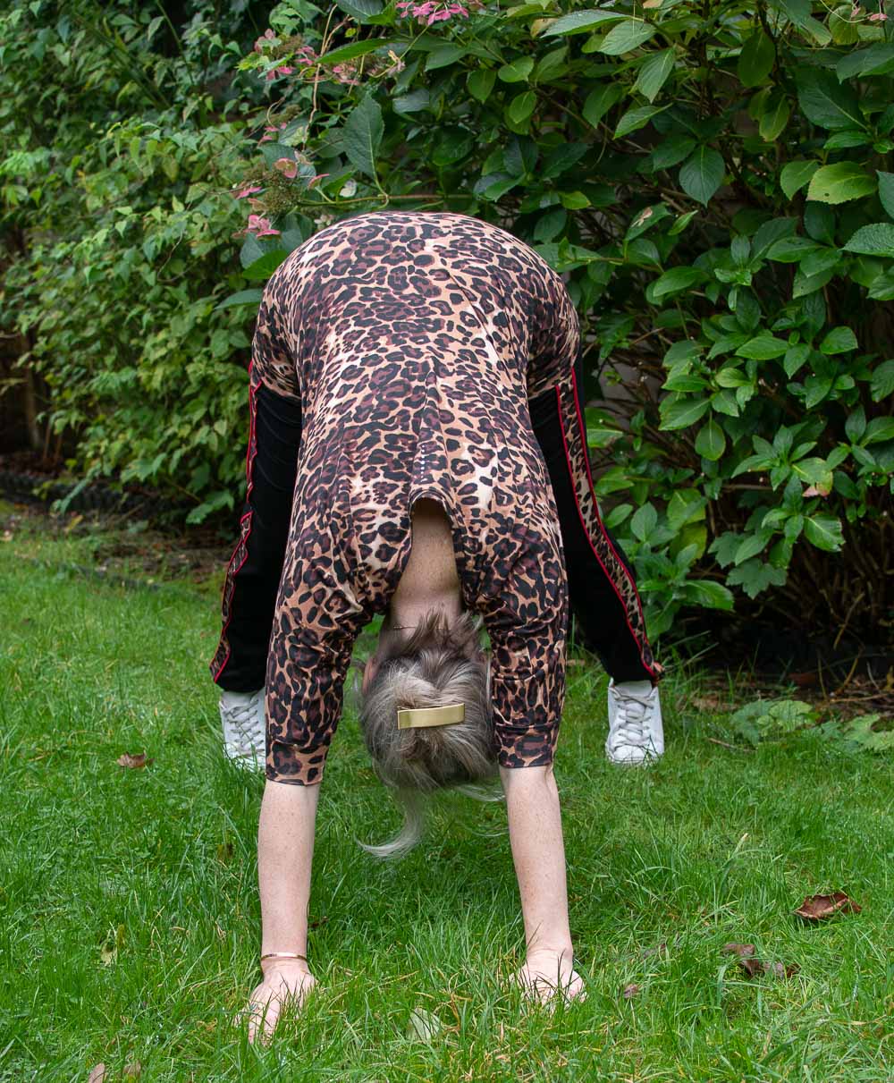 Karen Maurice of n4mummy doing a downward dog, wearing Asquith's eco-friendly activewear made from bamboo.