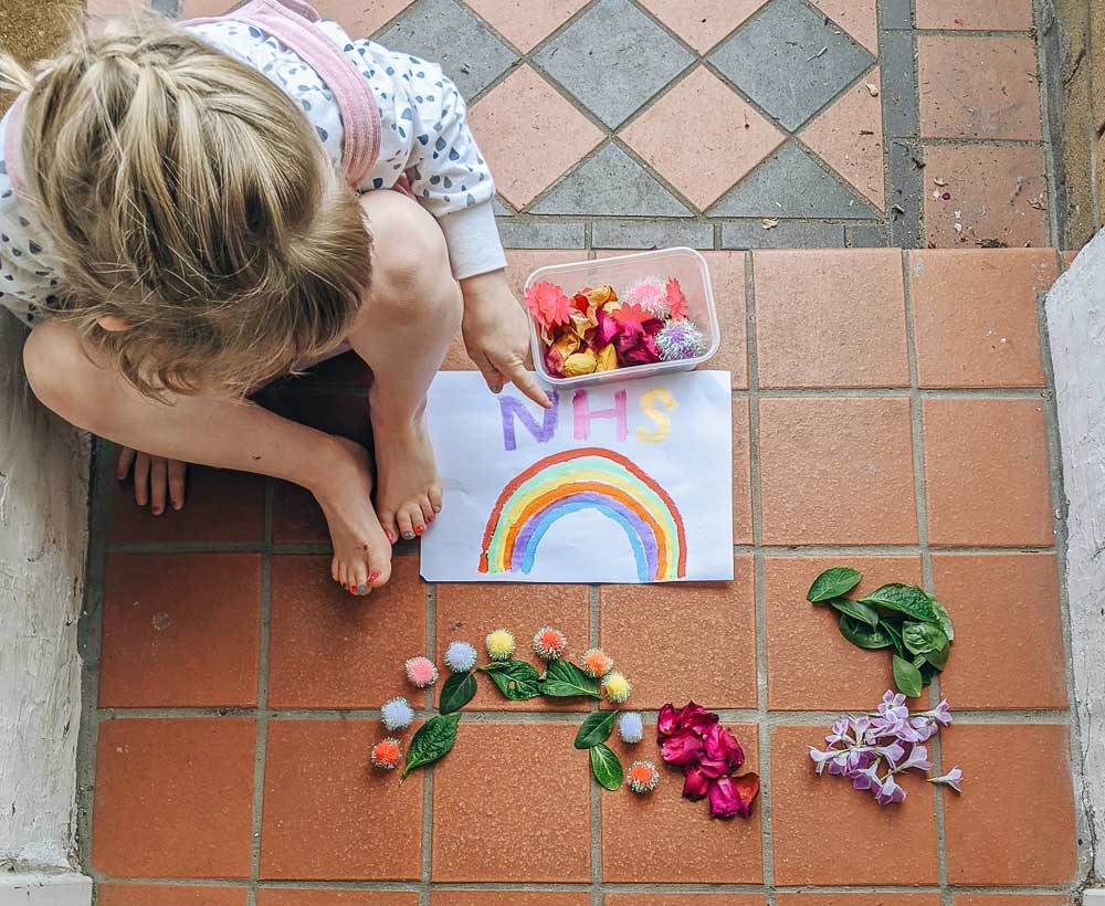 Daisy making the NHS rainbow picture for our window