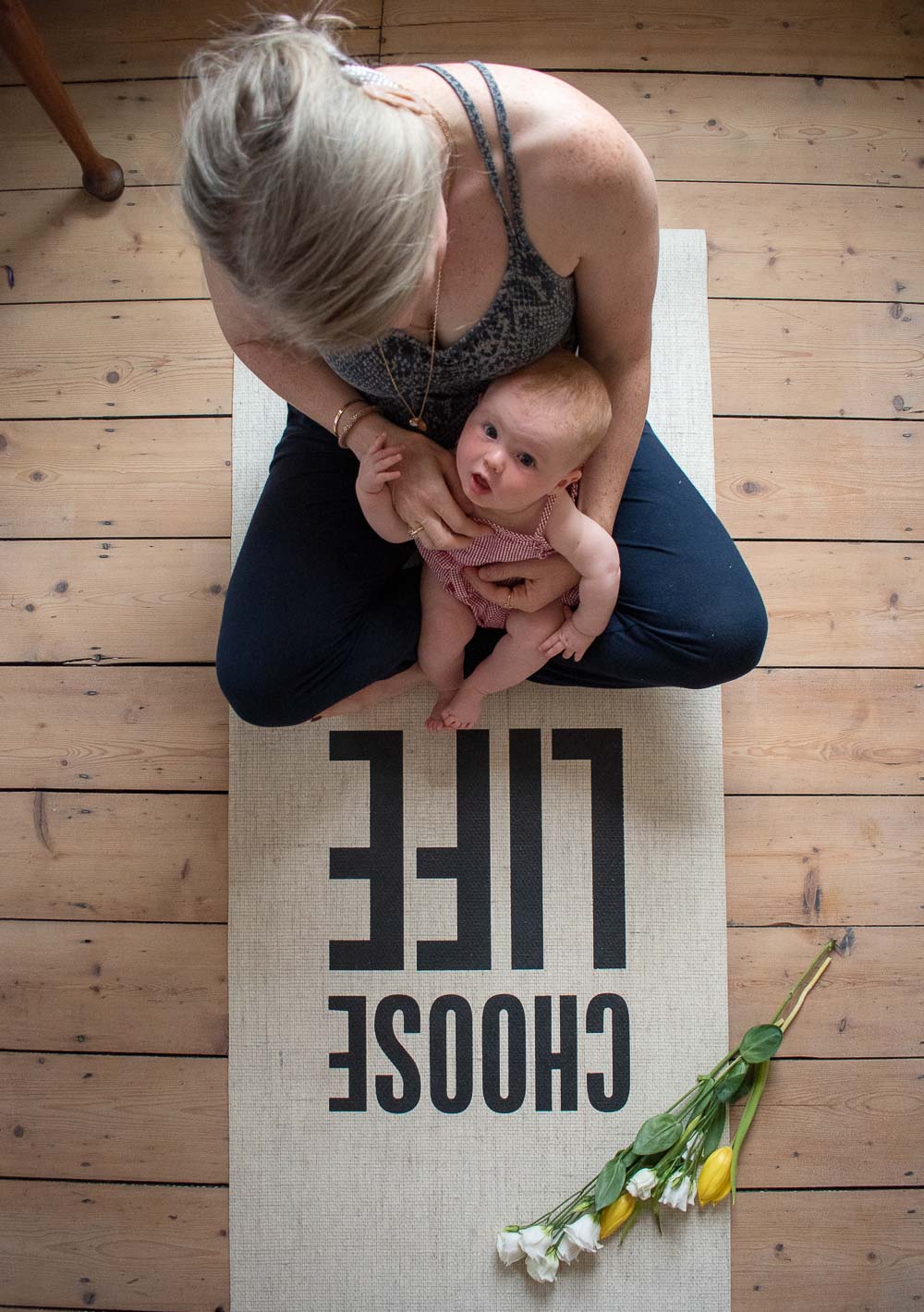 Karen Maurice of n4mummy in eco activewear from Asquith London and her daughter on a eco yoga mat from Beaumont Organic