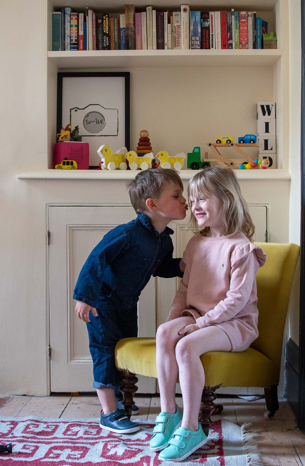 Perfectly behaved children in our tidy playroom, this is a photo not real life