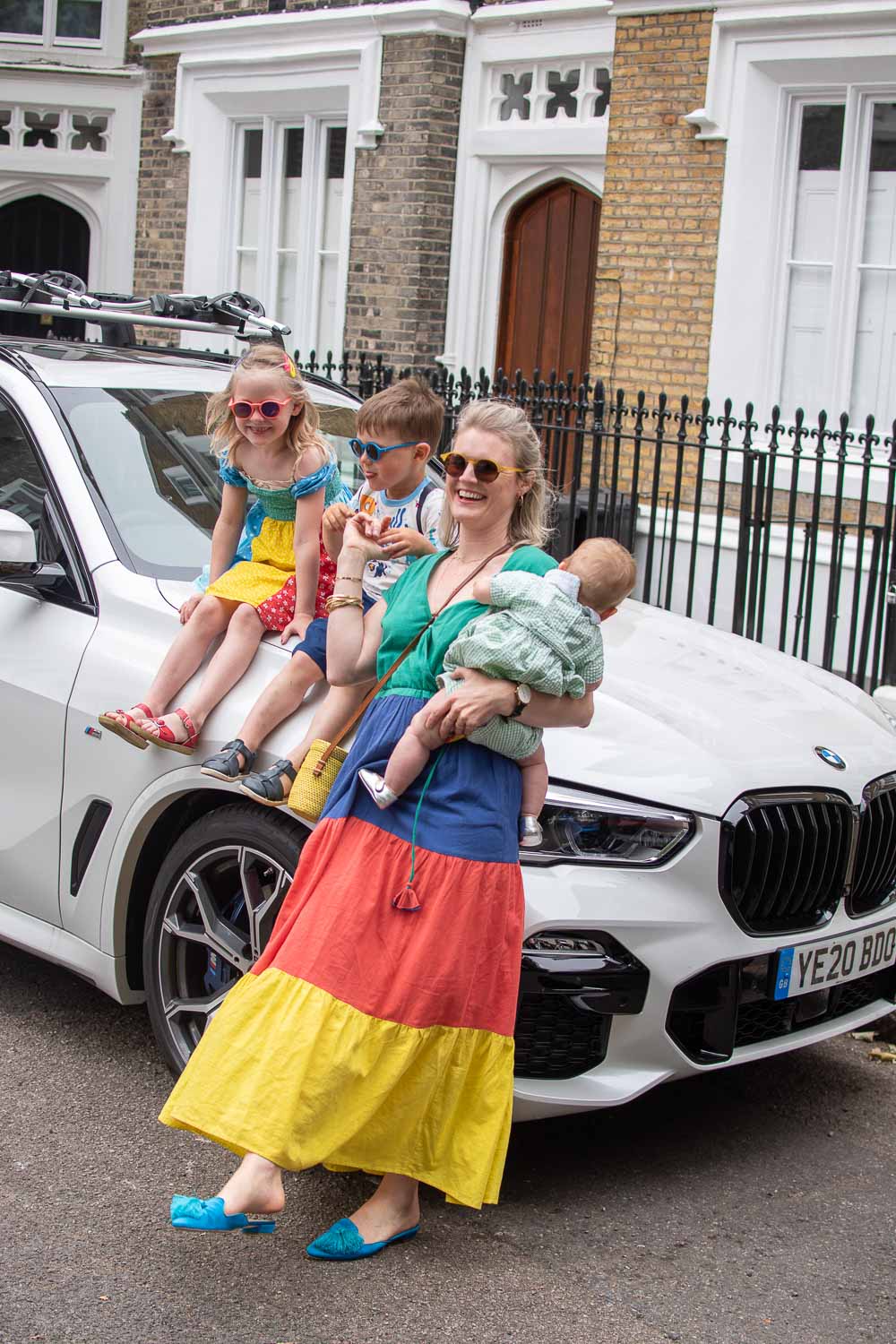 Karen Maurice of n4mummy with her three children outside of a BMW Hybrid car