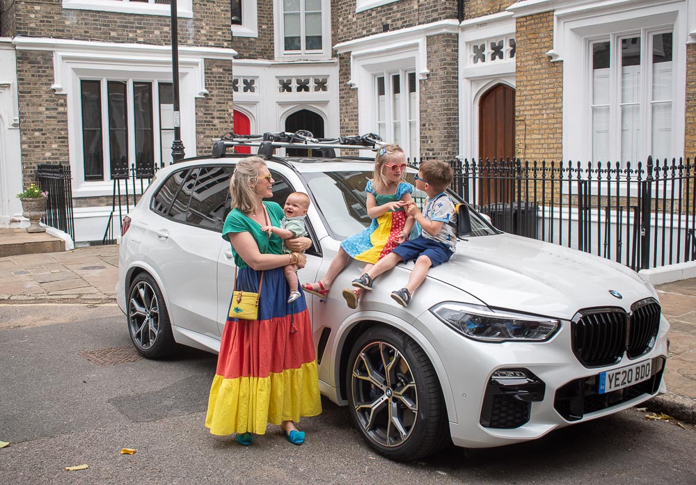 Karen Maurice, sustainable blogger of n4mummy, with her three children driving a BMW X5 Plug-in Hybrid car