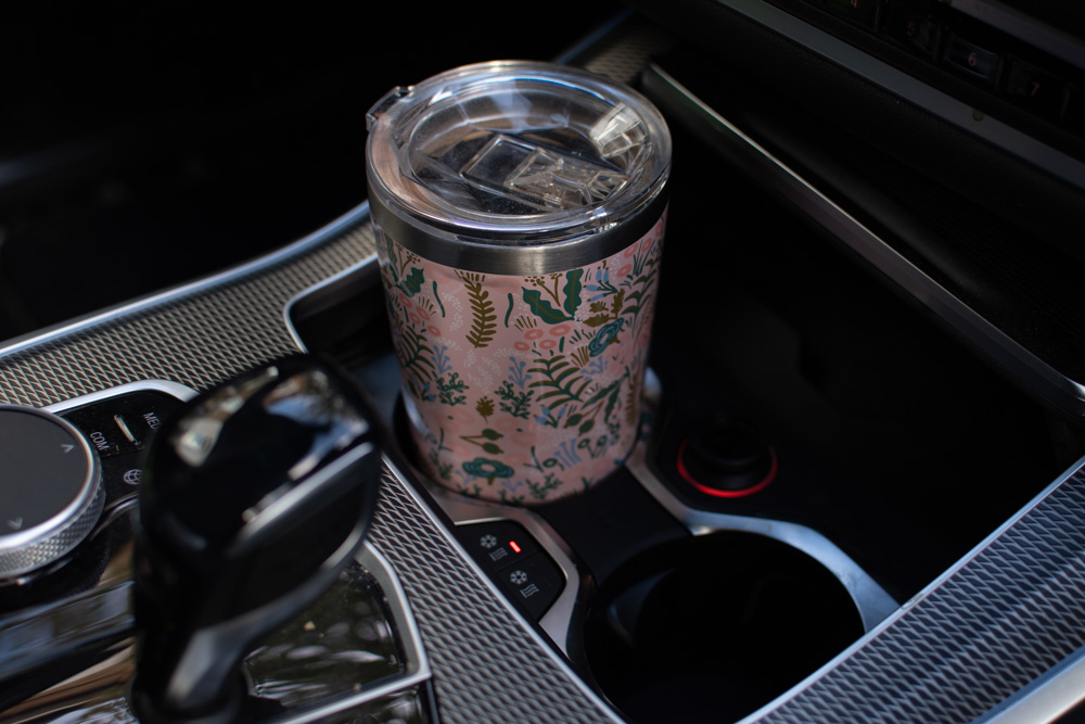 Inside the car you have cup holders that either warm or cool your drinks. 