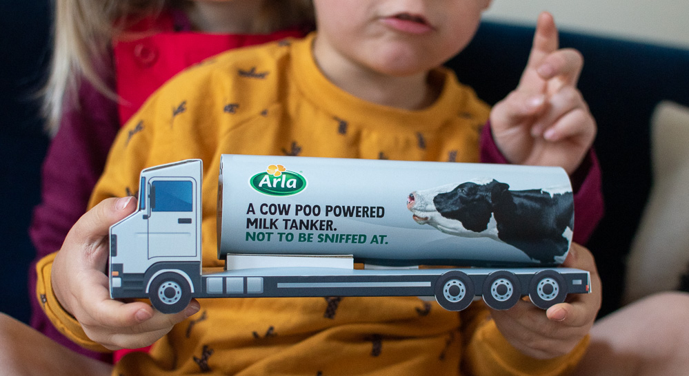 A toy copy of one of Arla's milk tankers that will be powered by cow poo, to help reduce their carbon footprint. 