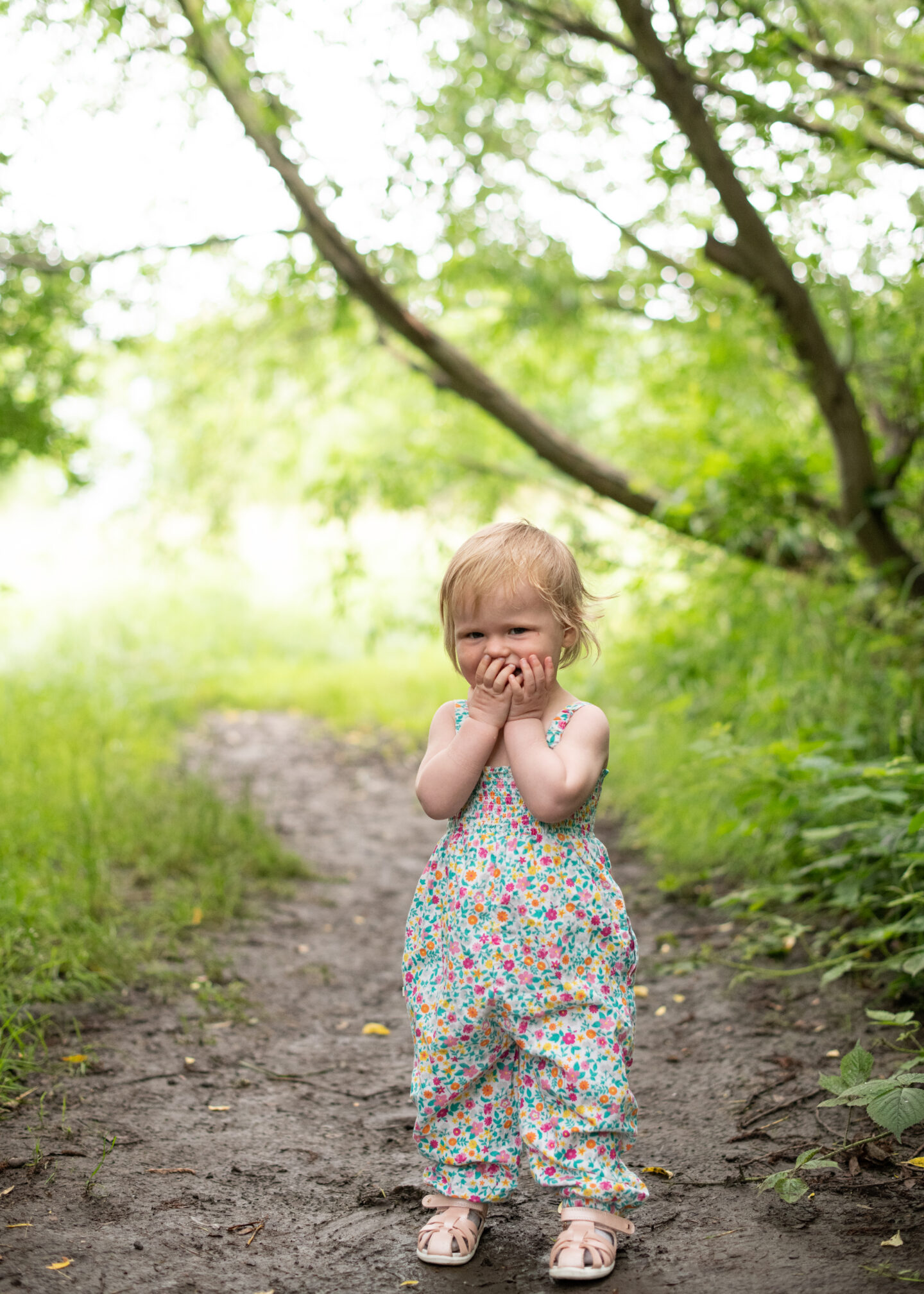 Looking shy for the camera, n4mummy's baby daughter wearing clothes from sustainable baby brand Frugi