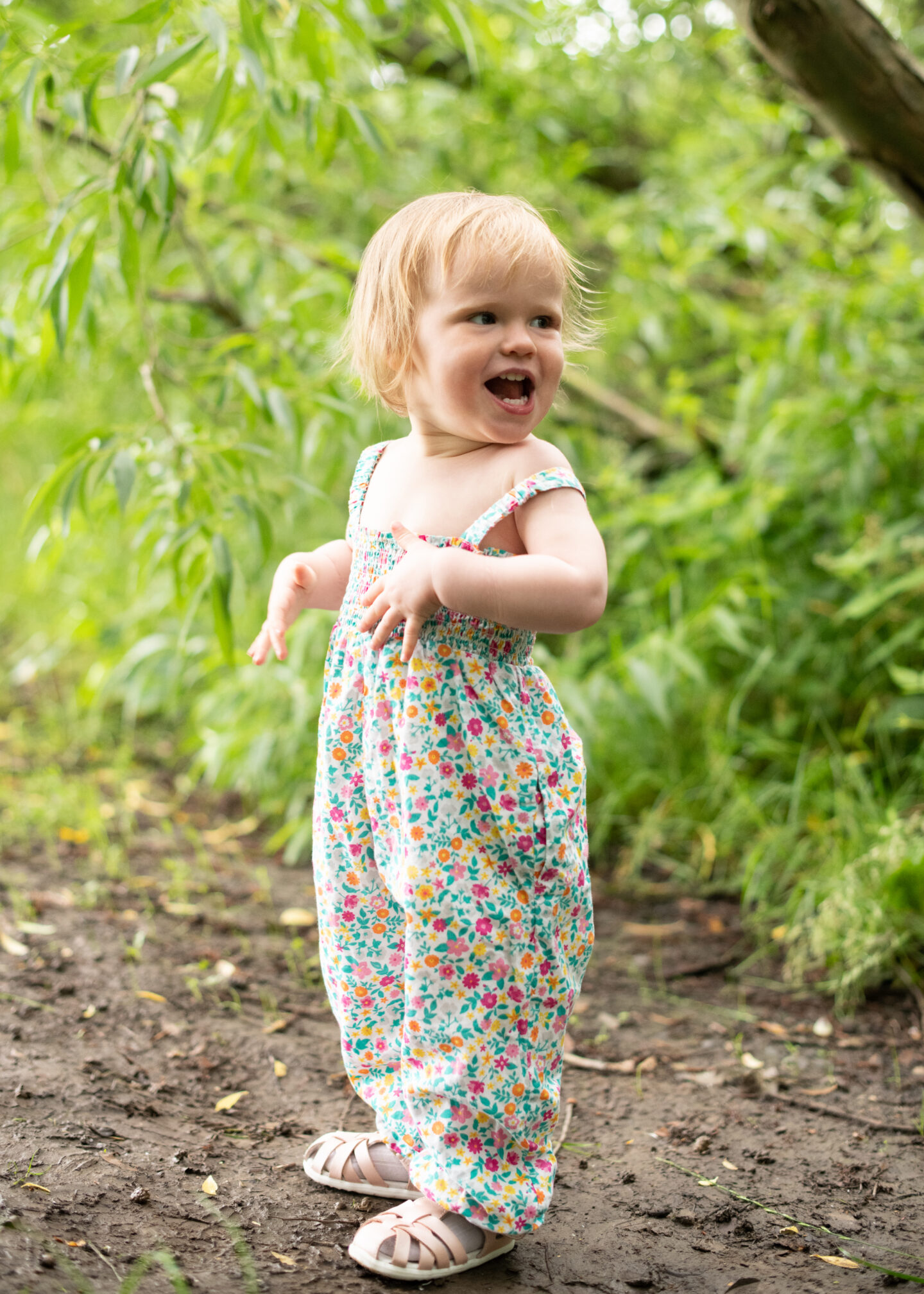 Looking shy for the camera, n4mummy's baby daughter wearing clothes from sustainable baby brand Frugi