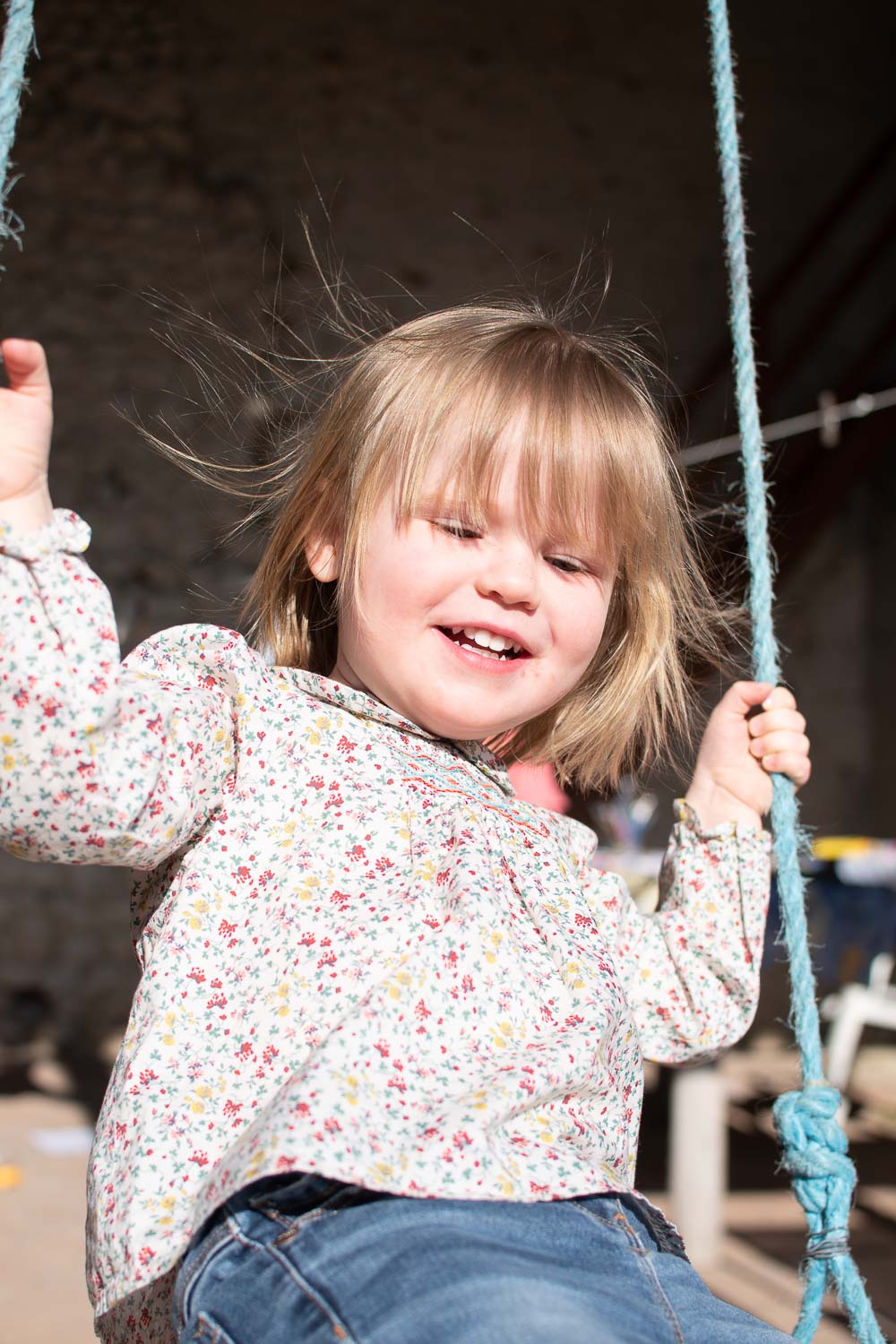 2 year old in second hand floral blouse from Bonpoint 